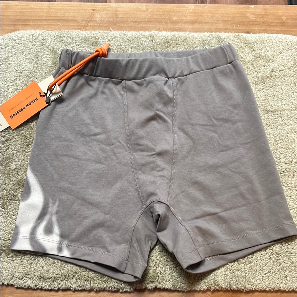 Women’s size small heron, Preston brand authentic gray flame cycling shorts